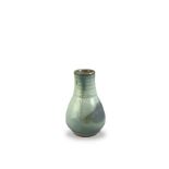 A CHINESE JUN WARE PEAR FORM POTTERY VASE With concentric rings to neck. (approx 12.5cm)