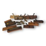 A COLLECTION OF EIGHT VINTAGE WOOD PLANES Including ones by W. Greenslade and Nixon, and five