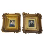 A PAIR OF EARLY 19TH CENTURY MINIATURE PAINTINGS ON IVORY, FAMILY PORTRAITS Gilt mounted and framed.