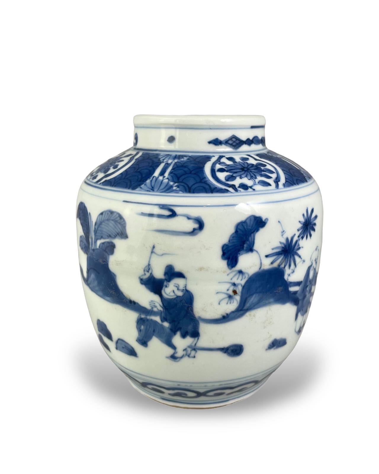 A CHINESE BLUE AND WHITE MING STYLE PORCELAIN JAR Depicting children in chinoiserie garden view,