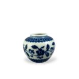 A SMALL CHINESE MING DESIGN BLUE AND WHITE PORCELAIN GLOBULAR JAR Hand painted floral decoration and