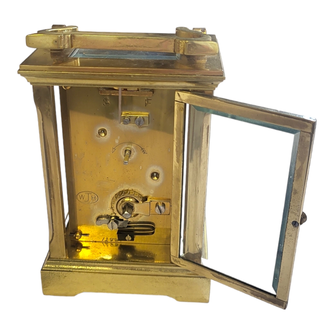 MAPPIN AND WEBB, A 20TH CENTURY GILT BRASS CARRIAGE CLOCK Having a single carry handle, white dial - Image 2 of 2