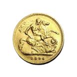 A 22CT GOLD HALF SOVEREIGN COIN, QUEEN VICTORIA, DATED 1896 With St. George and Dragon verso.