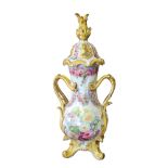 A FINE LATE 19TH CENTURY STAFFORDSHIRE STYLE ROCOCO MOULDED CONTINENTAL PORCELAIN POTPOURRI VASE AND