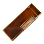 DUNHILL, A VINTAGE GOLD PLATE AND BROWN LACQUER CIGARETTE LIGHTER Rectangular form with flip lid,