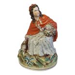 STAFFORDSHIRE, A FIGURAL GROUP OF LITTLE RED RIDING HOOD Polychrome painted with bright