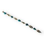 A VINTAGE 14CT GOLD AND TURQUOISE BRACELET Five turquoise beads interspersed with pierced oval