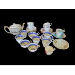 A SMALL COLLECTION OF EARLY 19TH CENTURY STAFFORDSHIRE TEAWARES Cups and saucers, in the style of