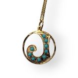 A 20TH CENTURY YELLOW METAL AND TURQUOISE PENDANT NECKLACE A pierced letter ‘J’ with cabochon cut