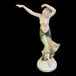 THURINGIAN, AN ART DECO KATZHÜTTE GLAZED PORCELAIN MODEL OF A SEMI NUDE DANCER Painted in pastel