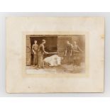 A MACABRE VICTORIAN PHOTOGRAPH OF CATTLE BEING SLAUGHTERED WITH A POLEAXE. Mounted, inscription to