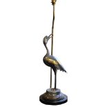 A MID 20TH CENTURY CAST METAL ALUMINIUM STORK STANDING LAMP BASE MODELLED AS A STANDING ORIENTAL