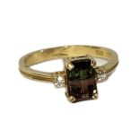AN 18CT GOLD, DIAMOND AND WATERMELON TOURMALINE RING The rectangular cut stone flanked by