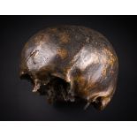 AN ANCIENT PRE-ROMAN HUMAN SKULL. Sharp-force trauma wounds front and back (probably from an axe