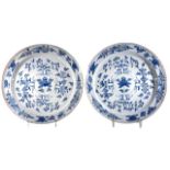 A PAIR OF 18TH CENTURY DUTCH DELFT BLUE & WHITE PLATES WITH YELLOW PAINTED RIMS Each decorated