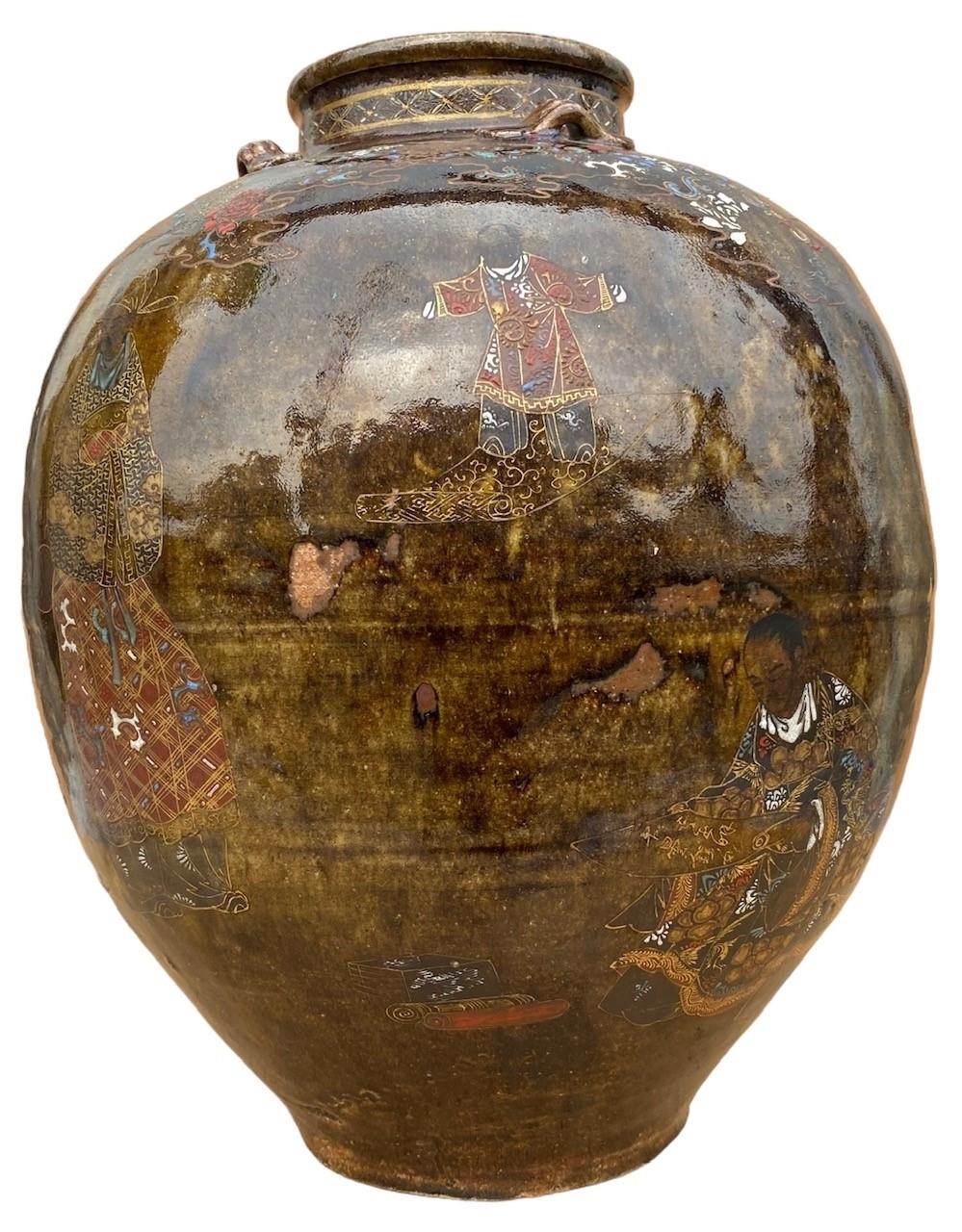 A LARGE 19TH CENTURY JAPANESE TEA JAR Decorated with painted enamel, gold figures and flowers,