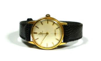 OMEGA, SWISS, A BOXED 1960’S GOLD PLATED 17 JEWELS GENTLEMAN’S WRISTWATCH Silvered dial with baton