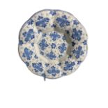 A LATE 17TH/EARLY 18TH CENTURY DELFTWARE LOBED PLATE Decorated in powder blue and white with