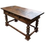 A 17TH CENTURY ITALIAN WALNUT CENTRE TABLE The single plank top above two drawers, supported on