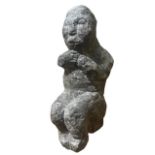 A STONE NOMOLI FIGURE, SIERRA LEONE, WITH A STYLISED SQUAT BODY, the figure is depicted in a