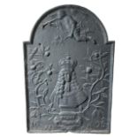 A LATE 17TH CENTURY ENGLISH CAST IRON RECTANGULAR FIREBACK Having an arched top, cast in relief with