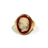 A LARGE VICTORIAN 14CT GOLD CARVED CARNELIAN CAMEO RING Depicting a carved female head. (22mm x