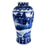A CHINESE BLUE AND WHITE BALUSTER VASE Decorated with landscape scene depicting The Great Wall Of