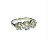 AN 18CT WHITE GOLD AND THREE STONE DIAMOND RING, APPROX TOTAL CARAT WEIGHT 2.75CT Having graduated