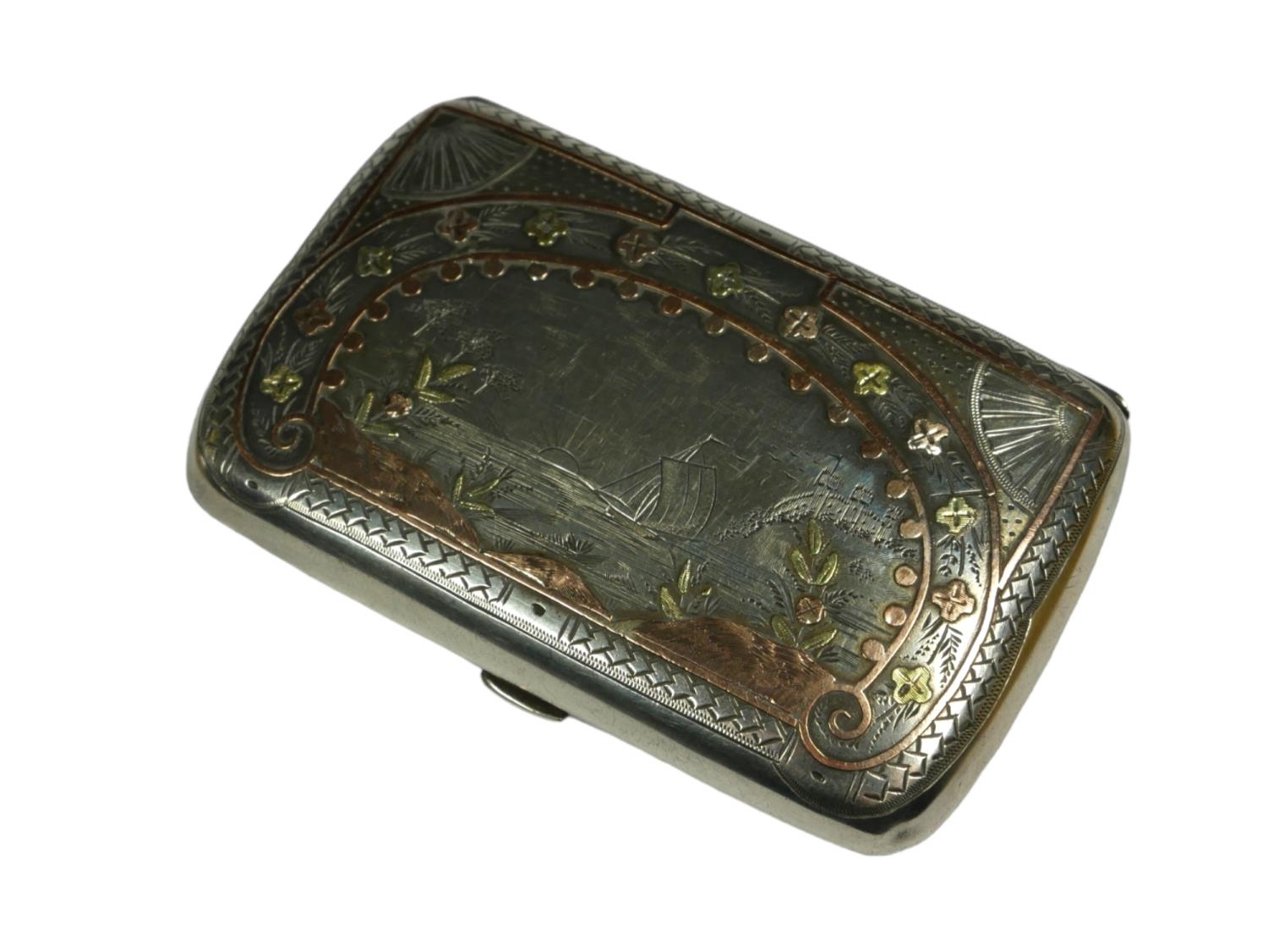 THOMAS MARSH & CO,. A VICTORIAN SILVER CIGARETTE CASE Hallmarked Birmingham, 1876, the front