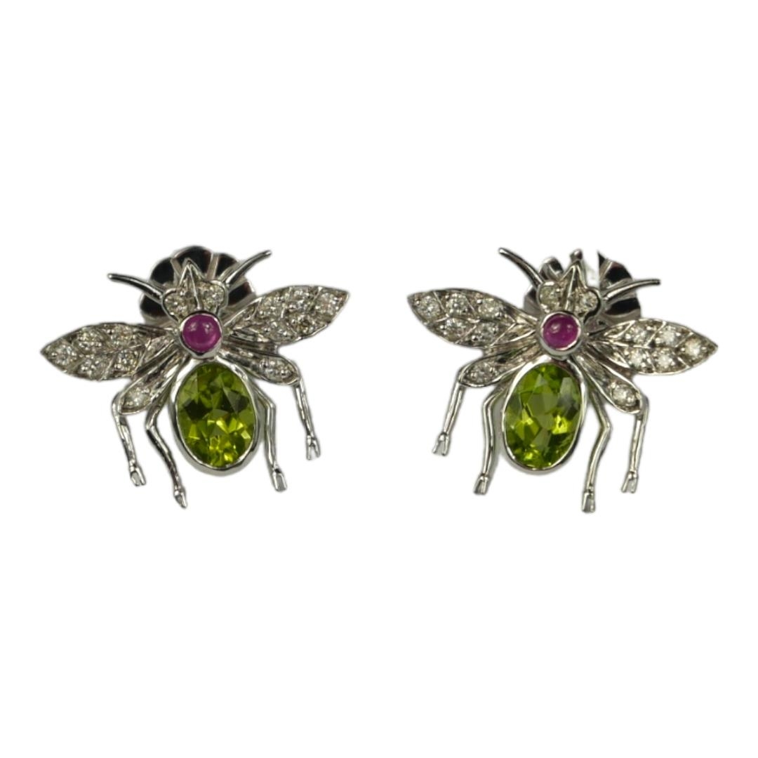 A PAIR 18CT WHITE GOLD LARGE FLY DESIGN EARRINGS, set with oval peridot, cabochon ruby and diamonds,