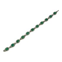 AN 18CT WHITE GOLD, EMERALD AND DIAMOND LINE BRACELET. (Approx. Oval emeralds 7.12ct total. Diamonds