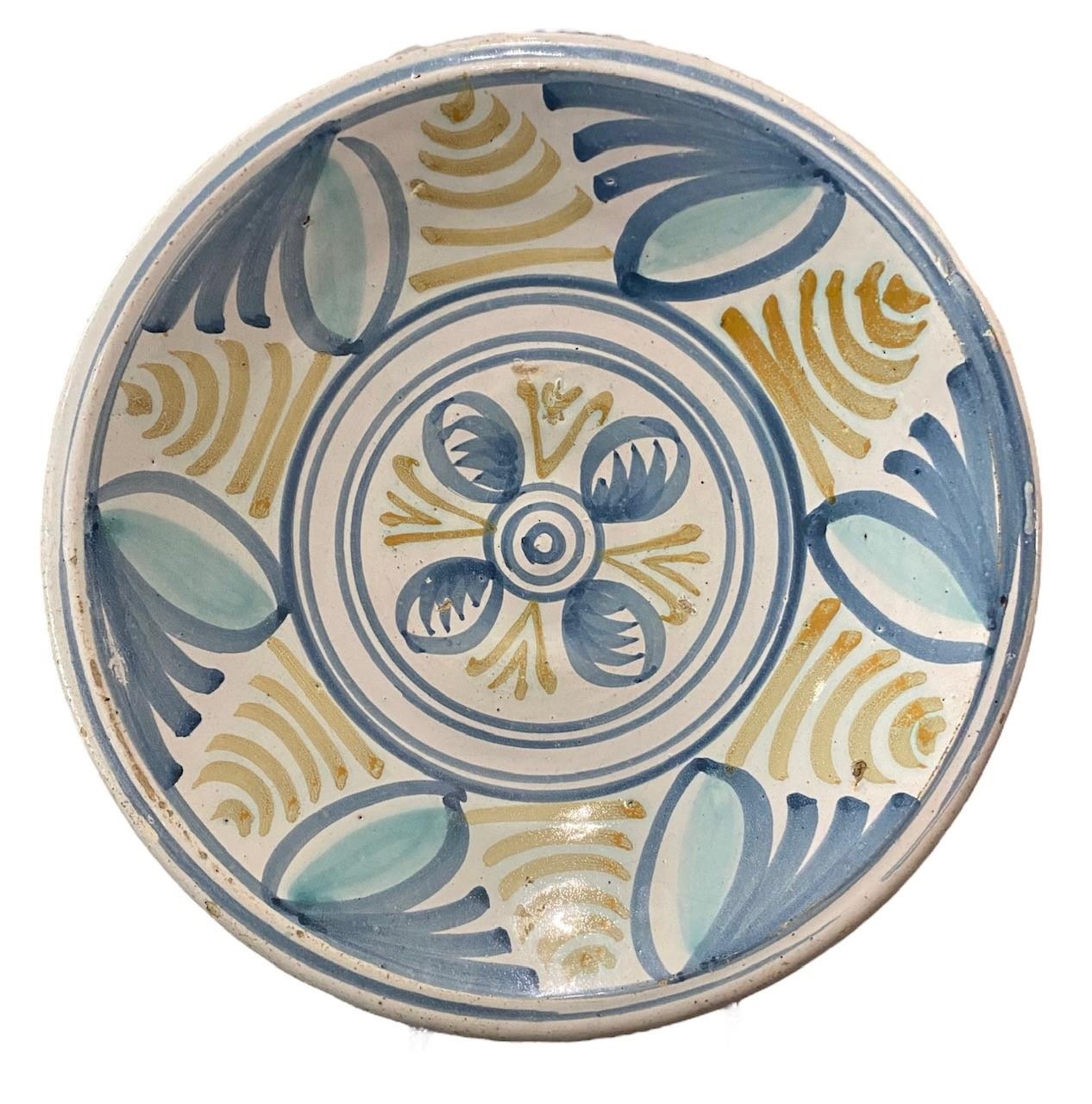 A 17TH CENTURY DELFTWARE LONDON POLYCHROME PLATE With radiating geometric design the back lead