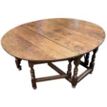 AN EXCEPTIONALLY LARGE 17TH CENTURY WILLIAM AND MARY OAK DOUBLE ACTION GATELEG DINING TABLE, CIRCA