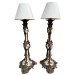 A PAIR OF LARGE 19TH CENTURY FRENCH BRONZE AND HAND PAINTED PORCELAIN LAMPS With scrolling foliage