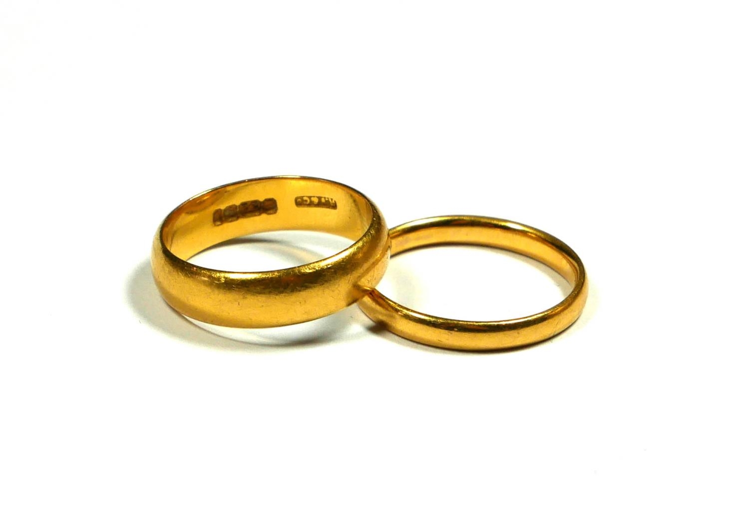 TWO 22CT YELLOW GOLD BANDS. (UK ring sizes M & M½, 8.2g)