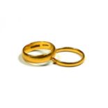 TWO 22CT YELLOW GOLD BANDS. (UK ring sizes M & M½, 8.2g)