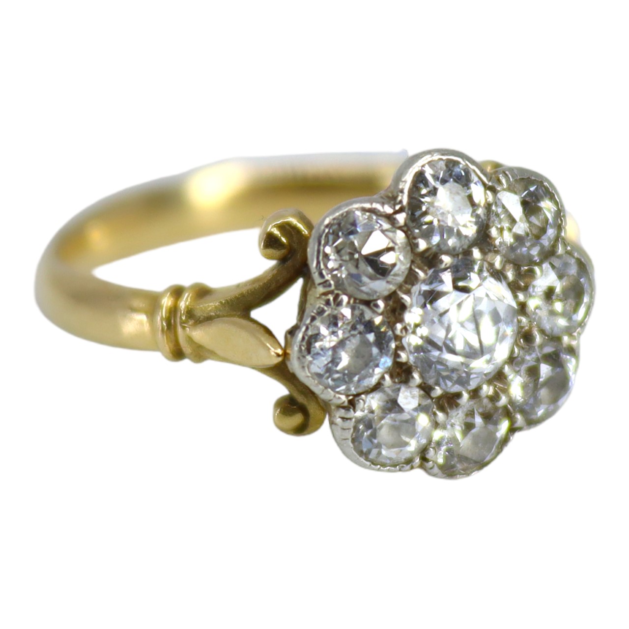 AN EDWARDIAN YELLOW METAL & DIAMOND CLUSTER RING, YELLOW METAL TESTED AS 18CT GOLD. Central bezel - Image 2 of 4