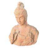 A LARGE CHINESE CARVED PINK MARBLE BUST OF GUANYIN. (h 57cm x w 46cm x depth 22cm)