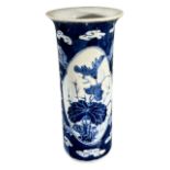A CHINESE BLUE AND WHITE CYLINDRICAL VASE Having flared upper rim, decorated with two medallions and