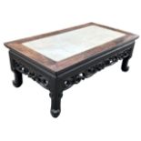 A 19TH CENTURY CHINESE HARDWOOD (POSSIBLY ZITAN LOW TABLE) WITH INSERTED MARBLE TOP Having carved