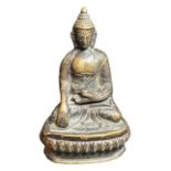 AN 18TH CENTURY CHINESE QING DYNASTY BRONZE SHAKYAMUNI BUDDHA STATUE Seated upon a lotus throne in a