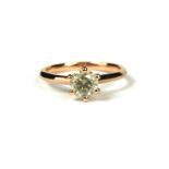 A 18CT ROSE GOLD DIAMOND SOLITAIRE RING. (Diamond 0.91ct)