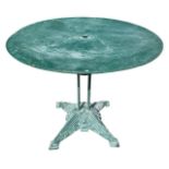 LOUIS VUITTON, PARIS, AN ART DECO BISTRO TABLE The circular top supported on four supports
