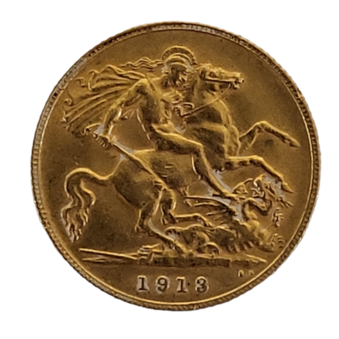 A KING GEORGE V 22ct GOLD HALF SOVEREIGN COIN dated 1913 with George and Dragon to reverse. Good