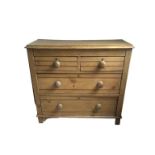 A LATE VICTORIAN PINE CHEST of two short above two long drawers Condition some age cracks and