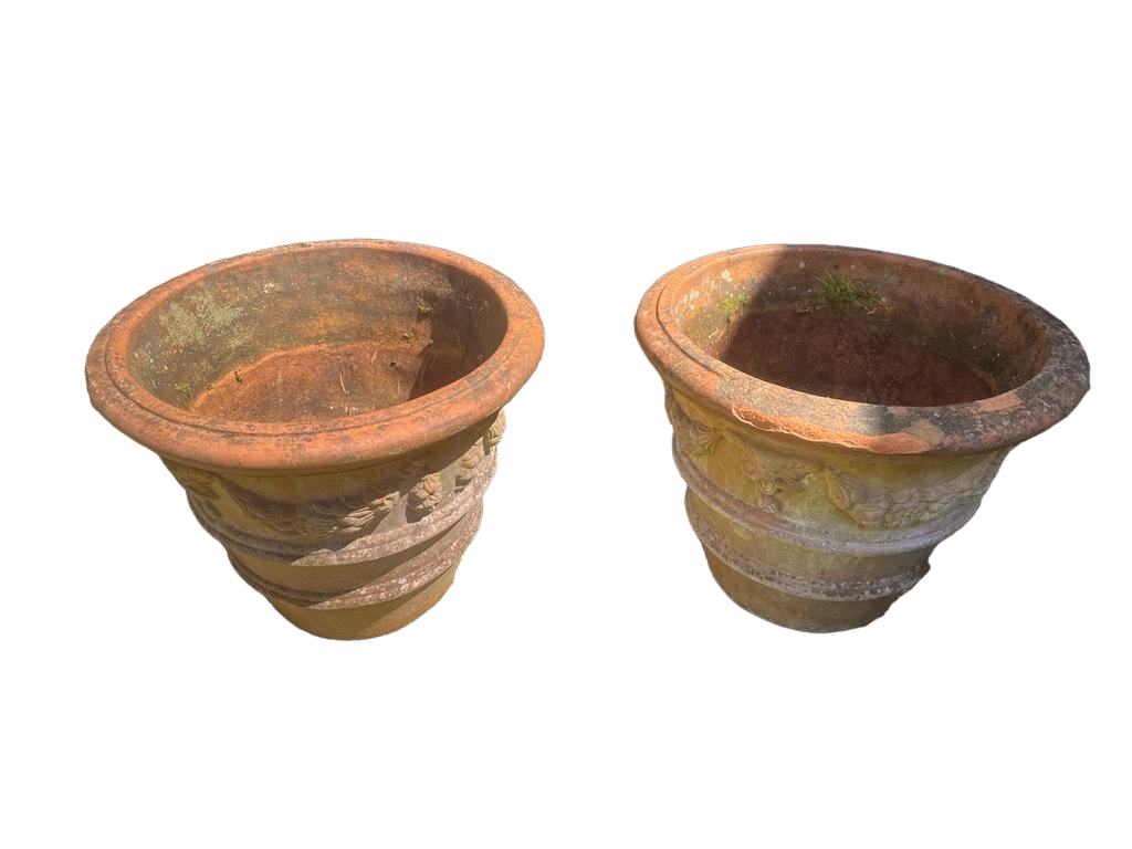 A PAIR OF LARGE TERRACOTTA GARDEN PLANTERS Decorated with swags. (71cm x 55cm) Condition: some chips