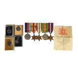 A SET OF WWII BRITISH MILITARY MEDALS To include 'Defence medal, Africa Star, Italy Star and 1939-45