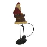 A VINTAGE TINPLATE SANTA CLAUS COUNTER BALANCE NOVELTY TOY Condition overall good 53cm