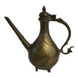 AN 18th CENTURY INDIAN MUGHAL BRASS 'AFTABAS' EWER having an onion form lid with lion form handle,