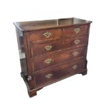 A GEORGIAN OAK CHEST OF TWO SHORT ABOVE THREE LONG DRAWERS with pierced brass swan neck handles,